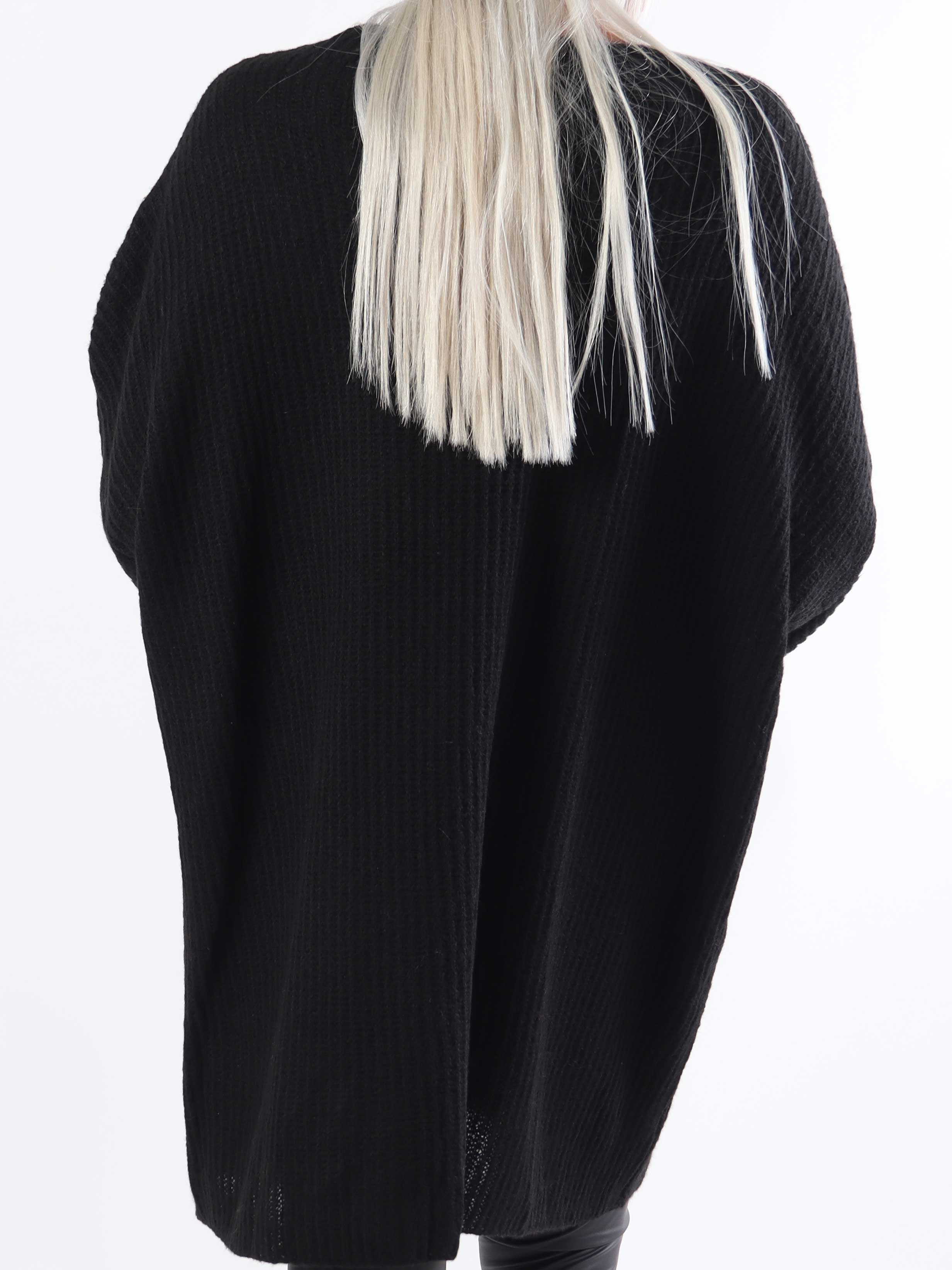 Dakota - Lång stickad blus i plus size med fickor